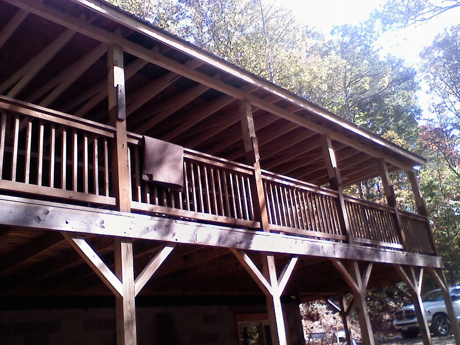Timber framing under a new elevated porch and deck — Roof Leak Repair in Weslaco by Roofing Brothers